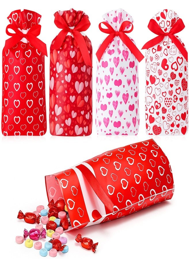 Harloon 48 Pcs Valentine's Day Treat Bags, Heart Shaped Plastic Drawstring Bags, 5.9 x 9.45 Inches Red Heart Gift Bag for Valentine Gifts Exchange Galentine Party Gift Packaging Reusable, 4 Patterns - Image 1